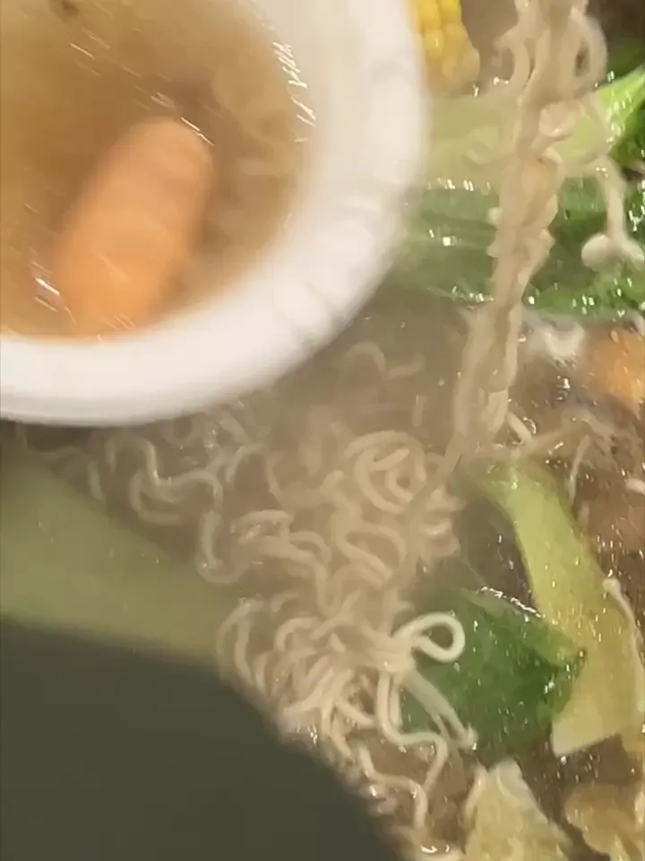 Noodles lifted from a hot pot at GOGI Geelong