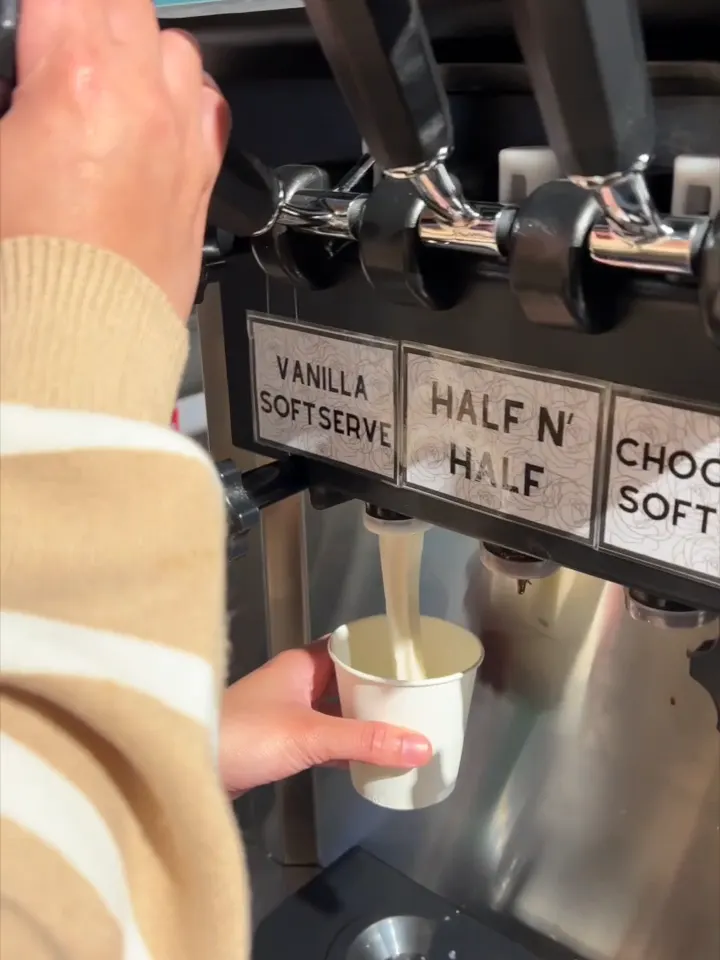 Pouring soft serve from the ice cream machine at GOGI