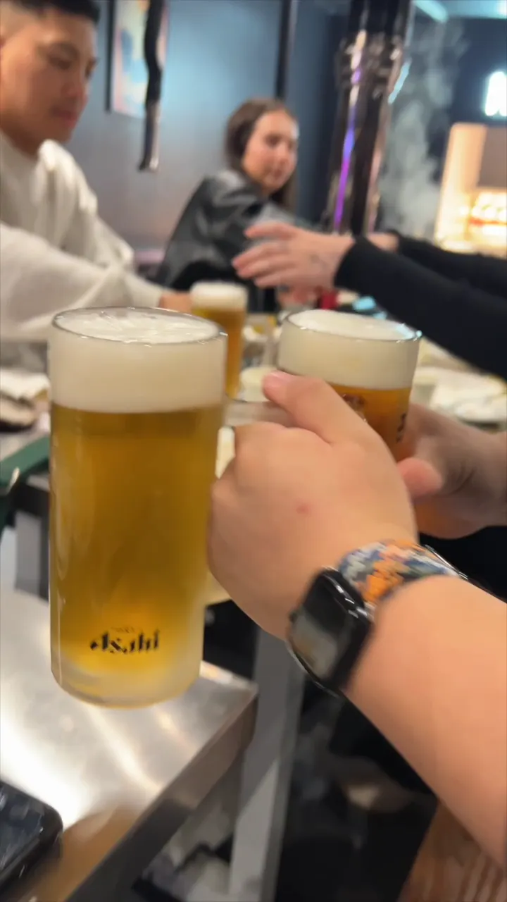 Beers clinking at GOGI Korean BBQ Buffet