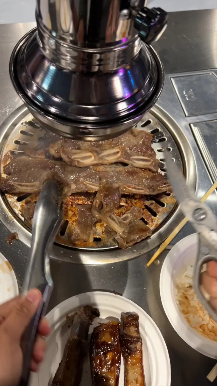 Marinated beef grilling at the table at GOGI Geelong